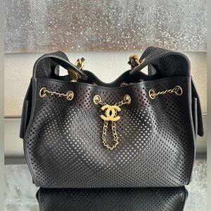 Chanel small 25 Perforated Calfskin & Gold-Tone Metal 
Dark Brown